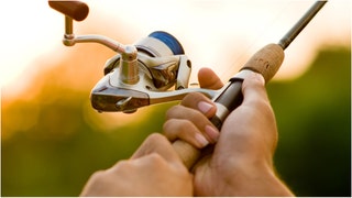 A man is going viral for snapping a kid's fishing pole during an argument. Watch the shocking videos. (Credit: Getty Images)