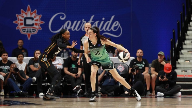 New York Liberty forward Breanna Stewart posts up Sun forward DeWanna Bonner during the 2024 WNBA Commissioner's Cup at the Mohegan Sun Arena in Connecticut. (Chris Marion/NBAE via Getty Images)
