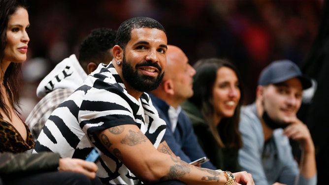 Canadian pop star Drake attends the the Miami Heat vs. Atlanta Hawks game in Florida. (Sam Navarro-USA TODAY Sports)
