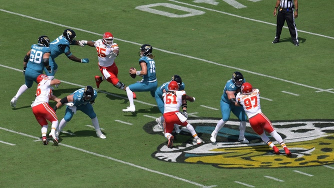 Jacksonville Jaguars QB Trevor Lawrence is pressured by Kansas City Chiefs DT Chris Jones in Week 2 last year at EverBank Stadium in Florida. (Bob Self/Florida Times-Union/USA TODAY NETWORK)