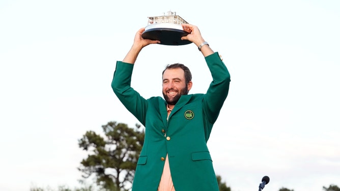 2024 Masters champion Scottie Scheffler poses during the green jacket ceremony at Augusta National Golf Club. (Rob Schumacher-USA TODAY Network)