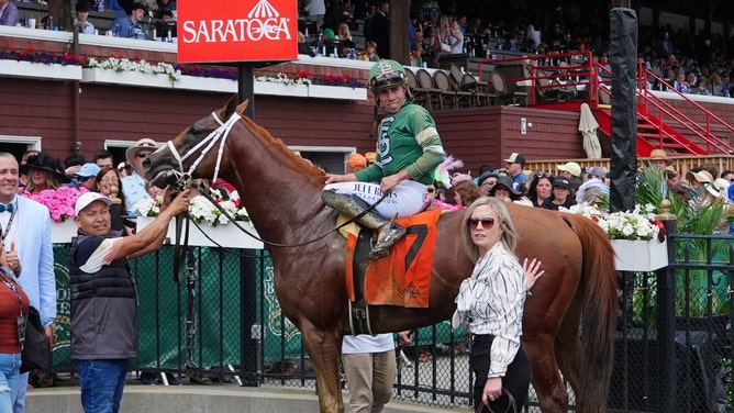 Baby Yoda with jockey, Eric Cancel, at the winner’s circle after winning the True North Stakes at Saratoga Race Course in New York. (Gregory Fisher-USA TODAY Sports)