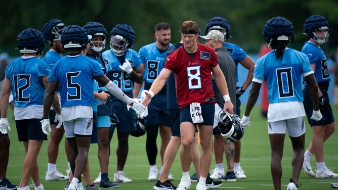 Tennessee Titans QB Will Levis congratulates his teammates after drills on the first day of training camp at Ascension Saint Thomas Sports Park. (Denny Simmons/The Tennessean/USA TODAY NETWORK)