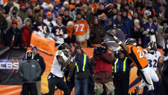 Jacoby Jones of the Baltimore Ravens catches a 70-yard touchdown pass against the Denver Broncos during the AFC Divisional Playoff Game. The play was later dubbed, 