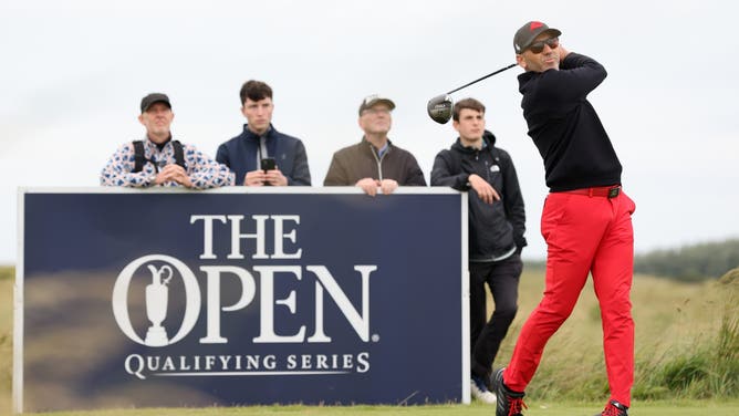 Sergio Garcia received a slow play warning from officials during an Open Championship qualifier and then failed to shoot a good enough score to earn his bid into the prestigious tournament.