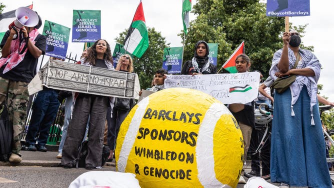 Anti-Israel protesters chanted "Free Palestine" outside Wimbledon and demanded the tournament drop Barclays as a sponsor.