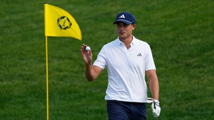 Ludvig Aberg waves to the crowd after holing out of the bunker on the 17th hole during the 2024 Memorial Tournament at Muirfield Village Golf Club. (Adam Cairns-USA TODAY Sports)