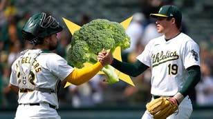 OAKLAND, CALIFORNIA - AUGUST 22: Shea Langeliers #23 and Mason Miller #19 of the Oakland Athletics celebrate defeating the Tampa Bay Rays 3-1 at the Oakland Coliseum on August 22, 2024 in Oakland, California. (Photo by Thearon W. Henderson/Getty Images)