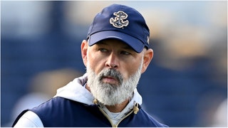 Navy football coach Brian Newberry was savagely roasted after attempting to pull off a heartwarming moment with Chreign LaFond. Watch the moment he found out his sister won at the Olympics. (Credit: Getty Images)