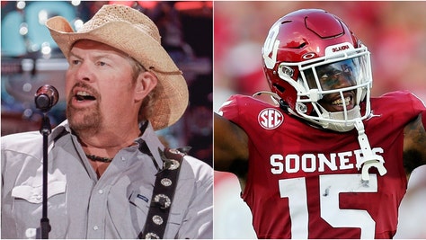 Oklahoma fans honored Toby Keith during a win over Temple by singing "Courtesy of the Red, White and Blue." Watch a video of fans singing his song. (Credit: Getty Images)