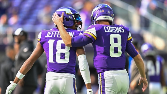 Minnesota Vikings WR Justin Jefferson and former QB Kirk Cousins warm up before a game against the Chicago Bears at U.S. Bank Stadium. (Jeffrey Becker-USA TODAY Sports)