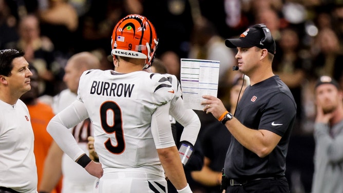 Cincinnati Bengals head coach Zac Taylor gives instructions to Joe Burrow vs. the New Orleans Saints at Caesars Superdome. (Stephen Lew-USA TODAY Sports)