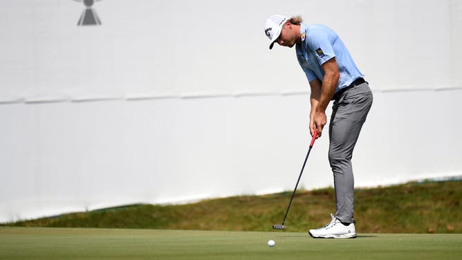 Sam Burns putts on the 11th hole the 2023 FedEx St. Jude Championship. (Christopher Hanewinckel-USA TODAY Sports)