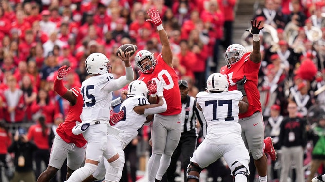 The Ohio State Buckeyes try to block Penn State Nittany Lions QB Drew Allar's pass at Ohio Stadium. (Adam Cairns/Columbus Dispatch/USA TODAY NETWORK) 