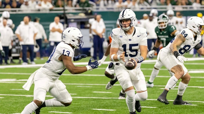 Penn State Nittany Lions QB Drew Allar hands off the ball to RB Kaytron Allen vs. the Michigan State Spartans at Ford Field in Detroit. (David Reginek-USA TODAY Sports)