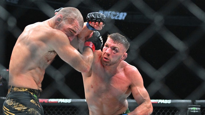 Dricus Du Plessis punches Sean Strickland during UFC 297 at ScotiaBank Arena in Toronto, Canada. (Dan Hamilton-USA TODAY Sports)