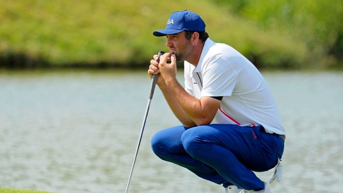 Scottie Scheffler lines up a putt in Round 2 of the Paris 2024 Olympic Summer Games at Le Golf National. (Michael Madrid-USA TODAY Sports)