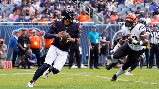 Chicago Bears QB Caleb Williams rolls out in a 2024 NFL preseason game against the Cincinnati Bengals at Soldier Field. (David Banks-USA TODAY Sports)