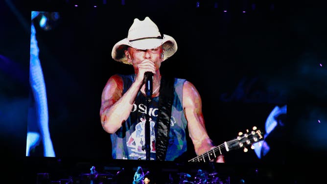 drunk cop peed on woman's boots kenny chesney concert