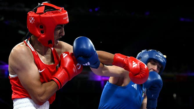 Algeria's Imane Khelif, who has XY chromosomes, punches Italy's Angela Carini in the women's 66kg preliminaries round of 16 boxing match during the Paris 2024 Olympic Games.