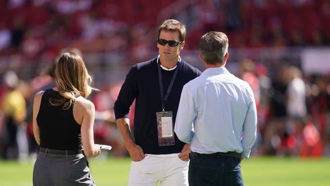 Former NFL quarterback Tom Brady stands on the field before the start of the game between the New Orleans Saints and the San Francisco 49ers at Levi's Stadium.