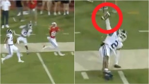 BYU DB Marque Collins pulls off crazy interception against SMU. (Credit: Screenshot/X Video https://x.com/Outkick/status/1832240916913942649/Game broadcast)