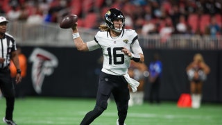 Jacksonville Jaguars QB Trevor Lawrence rolls out for a pass vs. the Atlanta Falcons at Mercedes-Benz Stadium in Georgia during an NFL 2024 preseason game. (Brett Davis-USA TODAY Sports)