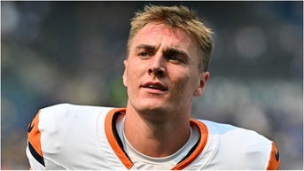 Denver Broncos QB Bo Nix had a hilarious response when asked about throwing a brutal interception. Watch a video of his comments. (Credit: Getty Images)