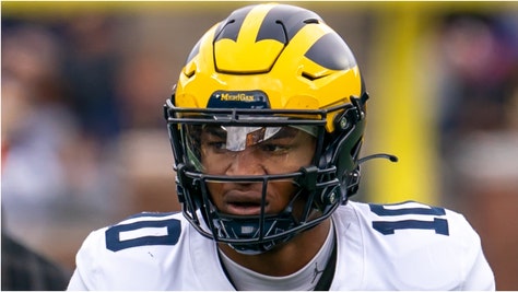 Michigan coach Sherrone Moore apparently didn't tell players about making a QB switch from Davis Warren to Alex Orji. They found out from the media. (Credit: Getty Images)