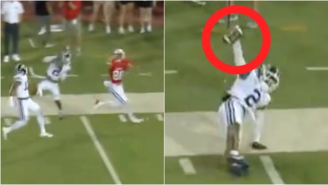 BYU DB Marque Collins pulls off crazy interception against SMU. (Credit: Screenshot/X Video https://x.com/Outkick/status/1832240916913942649/Game broadcast)