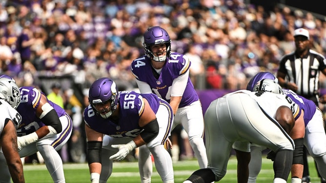 Vikings QB Sam Darnold makes pre-snap adjustments in an NFL preseason game vs. the Las Vegas Raiders at U.S. Bank Stadium in Minneapolis. (Stephen Maturen/Getty Images)
