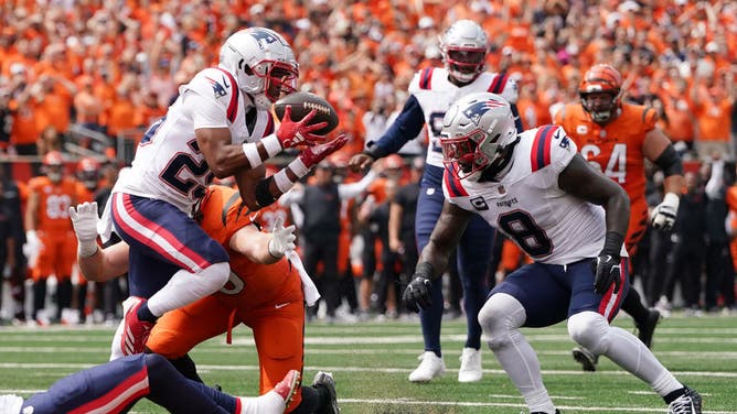 Marcus Jones of the New England Patriots recovers a fumble in the second quarter of the Week 1 NFL game against the Cincinnati Bengals. 