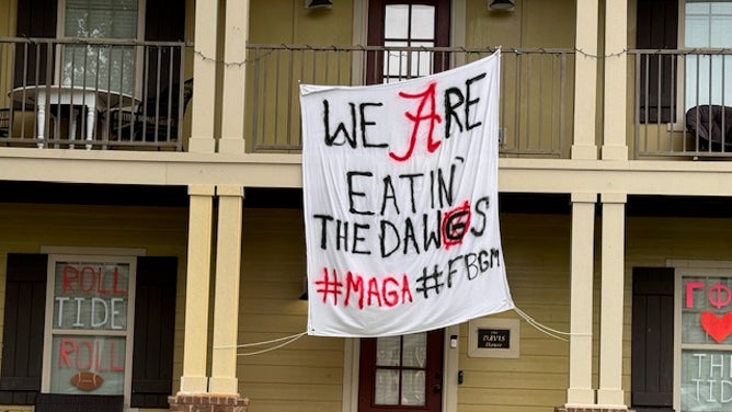 Alabama fans had fun with banners, as Georgia makes it way into town for a massive college football matchup