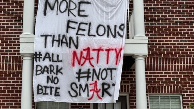 Alabama fans had fun with banners, as Georgia makes it way into town for a massive college football matchup