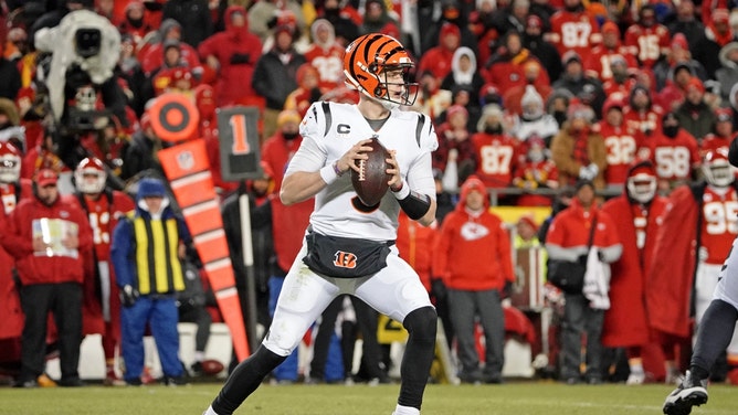 Cincinnati Bengals QB Joe Burrow drops back to pass against the Kansas City Chiefs during an AFC title game at GEHA Field at Arrowhead Stadium. (Denny Medley-USA TODAY Sports)