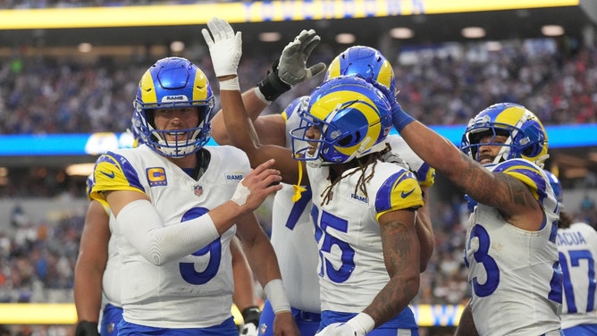 Los Angeles Rams QB Matthew Stafford celebrates with teammates after throwing a 7-yard TD pass against the Cleveland Browns at SoFi Stadium. (Kirby Lee-USA TODAY Sports)