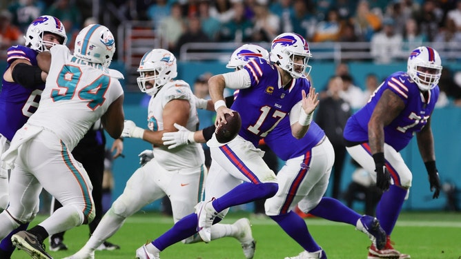 Buffalo Bills QB Josh Allen scrambles against the Miami Dolphins at Hard Rock Stadium in Florida. (Sam Navarro-USA TODAY Sports)