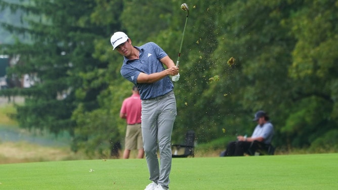 Michael Thorbjornsen hits an approach shot from the fairway on the third hole of the 2024 Travelers Championship golf tournament at TPC River Highlands in Connecticut. (Gregory Fisher-USA TODAY Sports)