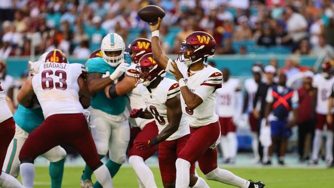 Washington Commanders QB Jayden Daniels throws a pass vs. the Dolphins during an NFL preseason game at Hard Rock Stadium in Miami. (Sam Navarro-USA TODAY Sports)