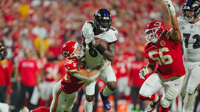 Baltimore Ravens QB Lamar Jackson is tackled by Kansas City Chiefs LB Leo Chenal during the 2024 NFL Kickoff Game. (Jay Biggerstaff-Imagn Images)