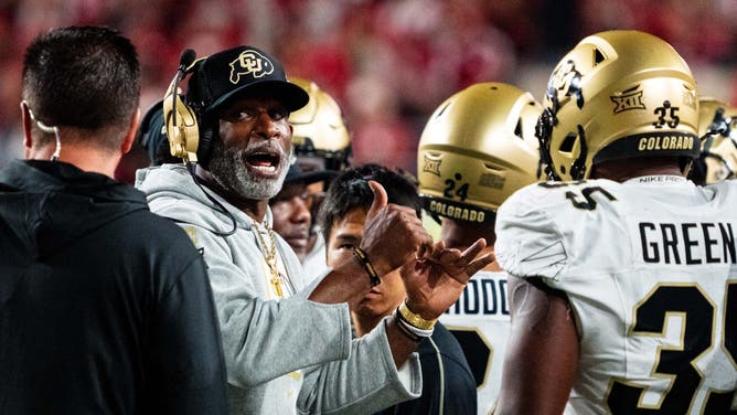 Sep 7, 2024; Lincoln, Nebraska, USA; Colorado Buffaloes head coach Deion Sanders talks with players during a timeout in the third quarter against the Nebraska Cornhuskers at Memorial Stadium. (Credit: Dylan Widger-Imagn Images via USA Today Sports Network)