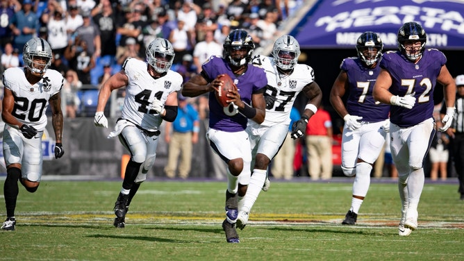 Baltimore Ravens QB Lamar Jackson takes off against the Las Vegas Raiders at M&T Bank Stadium in Maryland. (Tommy Gilligan-Imagn Images)