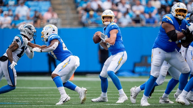 Los Angeles Chargers QB Justin Herbert drops back to pass vs. the Carolina Panthers at Bank of America Stadium in Charlotte. (Jim Dedmon-Imagn Images)