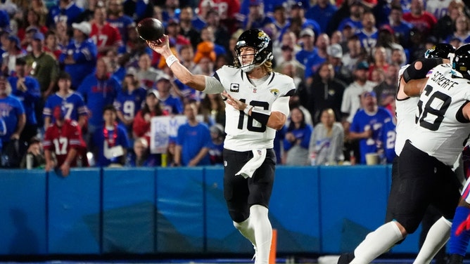 Jacksonville Jaguars QB Trevor Lawrence drops back to pass on the Buffalo Bills at Highmark Stadium in New York. (Gregory Fisher-Imagn Images)