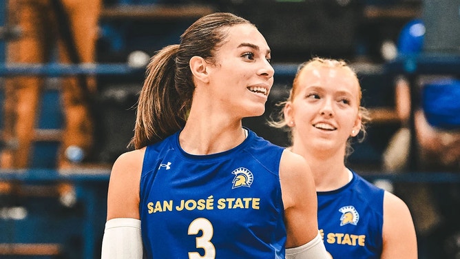 San Jose State associate head volleyball coach Melissa Batie-Smoose spoke out about transgender player Blaire Fleming (center) and the school suspended her indefinitely. Team co-captain Brooke Slusser (right) said the team was furious with the school's decision. 