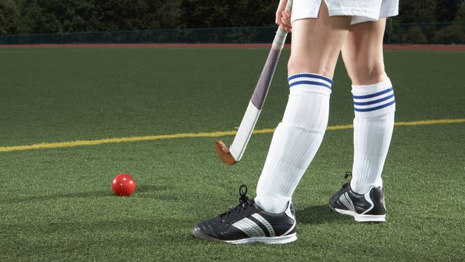 A high school girls' field hockey team in Massachusetts forfeited a game rather than force its players to compete against male opponents.