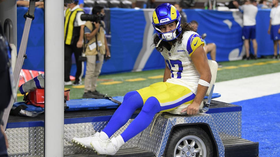 Sep 8, 2024; Detroit, Michigan, USA; Los Angeles Rams wide receiver Puka Nacua (17) is carted off the field after being injured against the Detroit Lions in the first half at Ford Field. Mandatory Credit: Lon Horwedel-Imagn Images