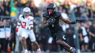 Oregon WR Traeshon Holden  ejected for spitting on Ohio State defender