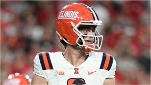 The Illinois Fighting Illini will wear awesome throwback uniforms against Michigan State. See photos of what the uniforms look like. (Credit: Getty Images)