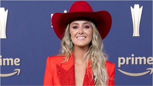 Country music star Lainey Wilson visited Hurricane Helene victims and those helping to rebuild. See photos of her Chimney Rock, North Carolina. (Credit: Getty Images)